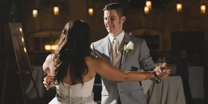 Bride and groom dancing together, the kind of first dance taught in Ottawa wedding dance lessons at DQ Ballroom & Fitness